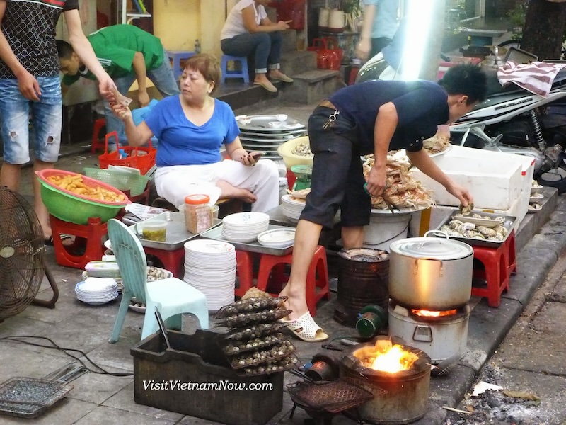 A bustling street scene in Hanoi's Old Quarter