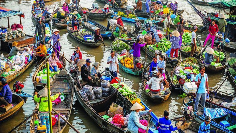 Boats laden with fresh produce at Cai Rang Floating Market