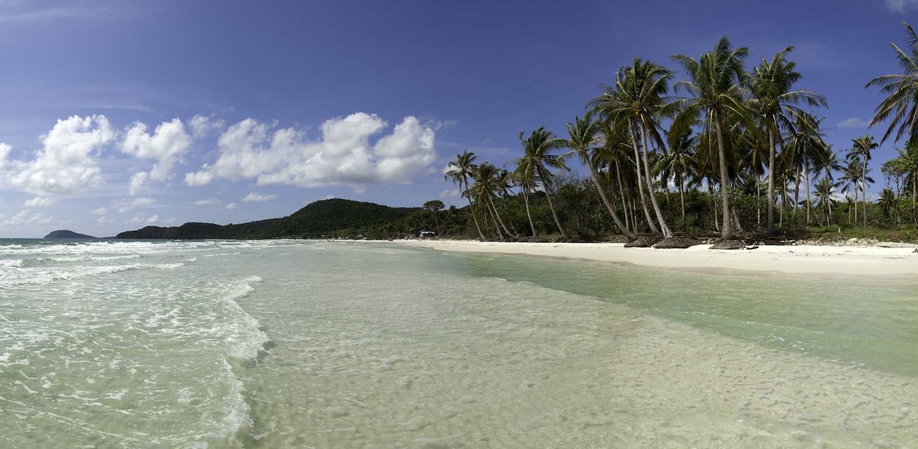 A stunning aerial view of a white sand beach and turquoise water in Phu Quoc