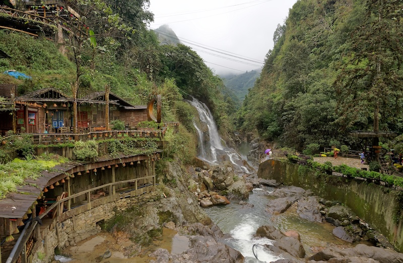 A traditional house and water wheel in Cat Cat Village