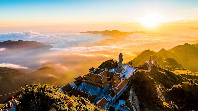 The summit of Fansipan Peak, the Roof of Indochina, above the clouds